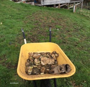 wheelbarrow of stones