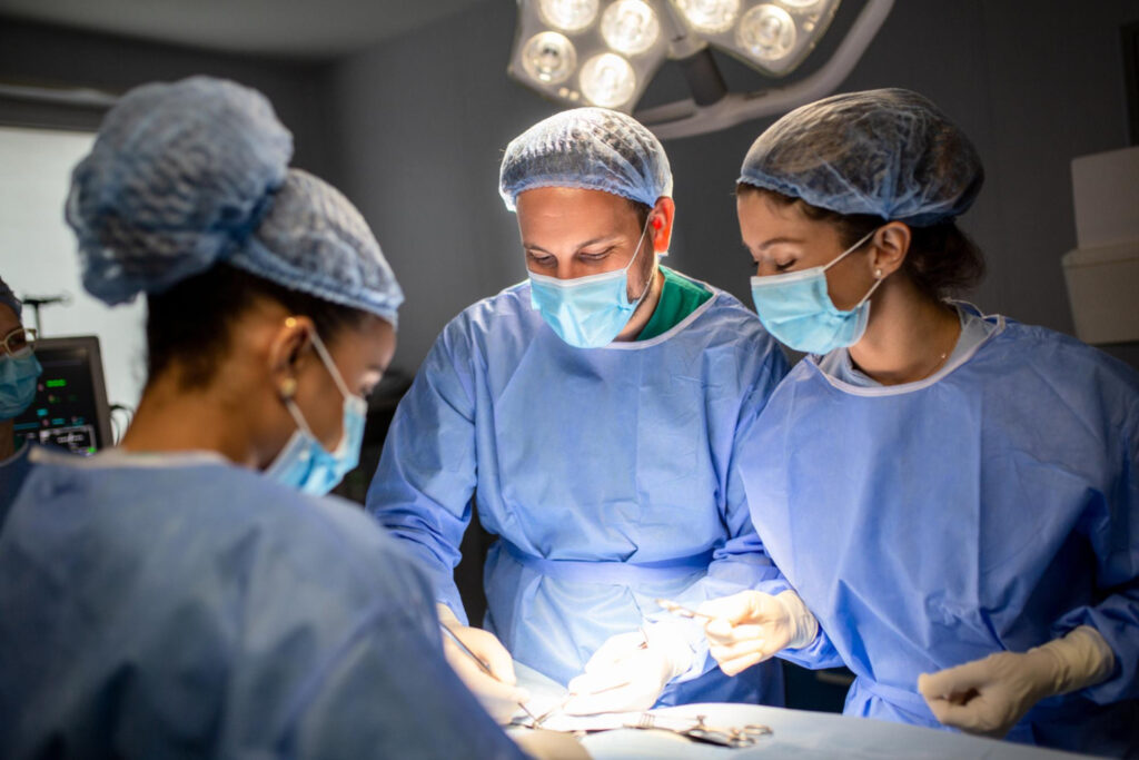 Doctors doing a surgical procedure
